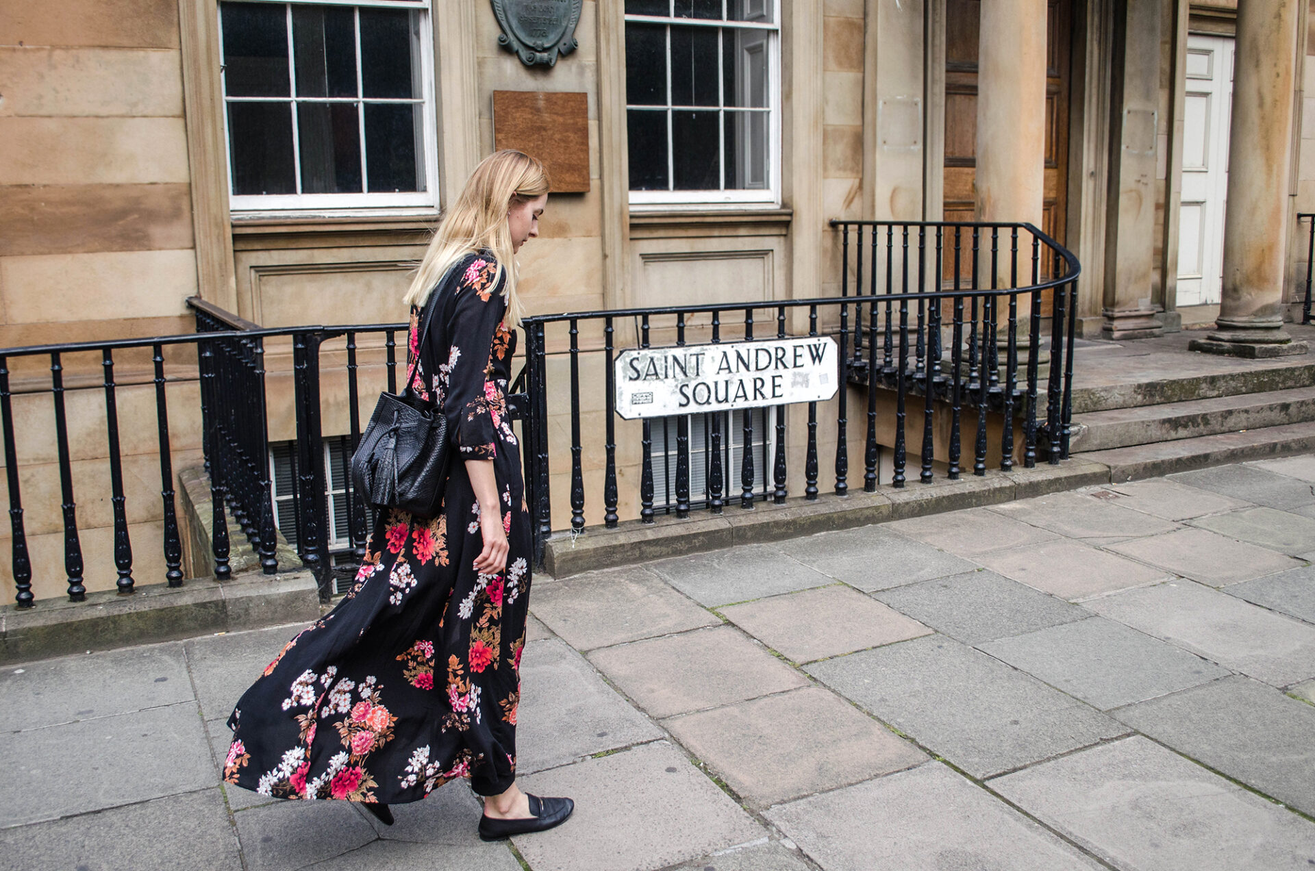 Girl in linen jacket- Chylak bag and floral maxi dress