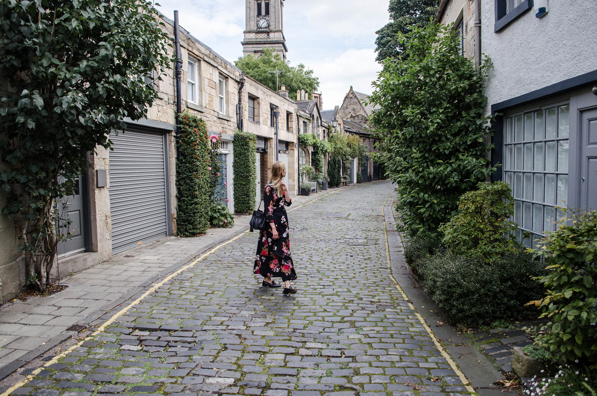 Girl in linen jacket- Chylak bag and floral maxi dress